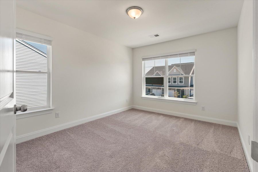 Spacious, unfurnished interior of a new home in The Landings at Montague, Goose Creek (Image 22).