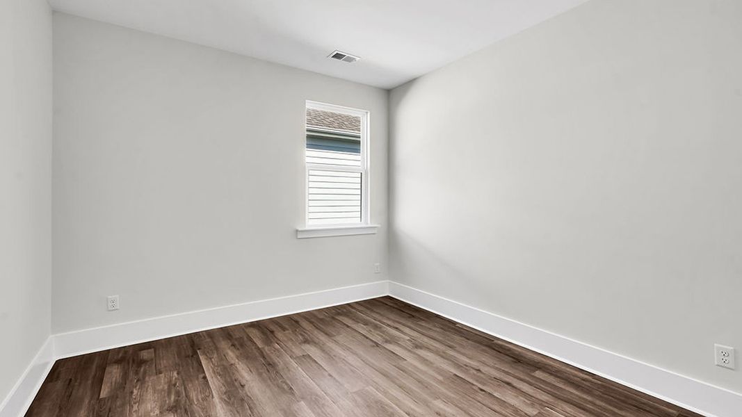 Spacious, unfurnished interior of a new home in The Haven at Indigo Preserve, Leland (Image 22).