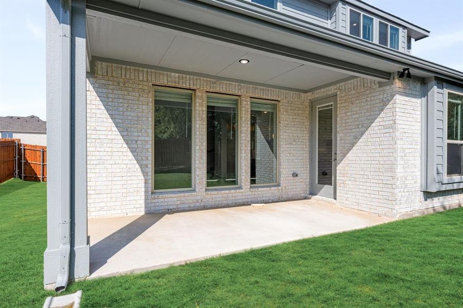Front exterior of a new home in Ridgepoint, Midlothian, TX, highlighting curb appeal (Image 2). Front exterior of a new home in Ridgepoint, Midlothian, TX, highlighting curb appeal (Image 2).