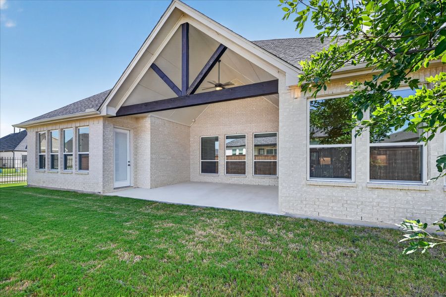 Front exterior of a new home in LeTara, Haslet, TX, highlighting curb appeal (Image 20).
