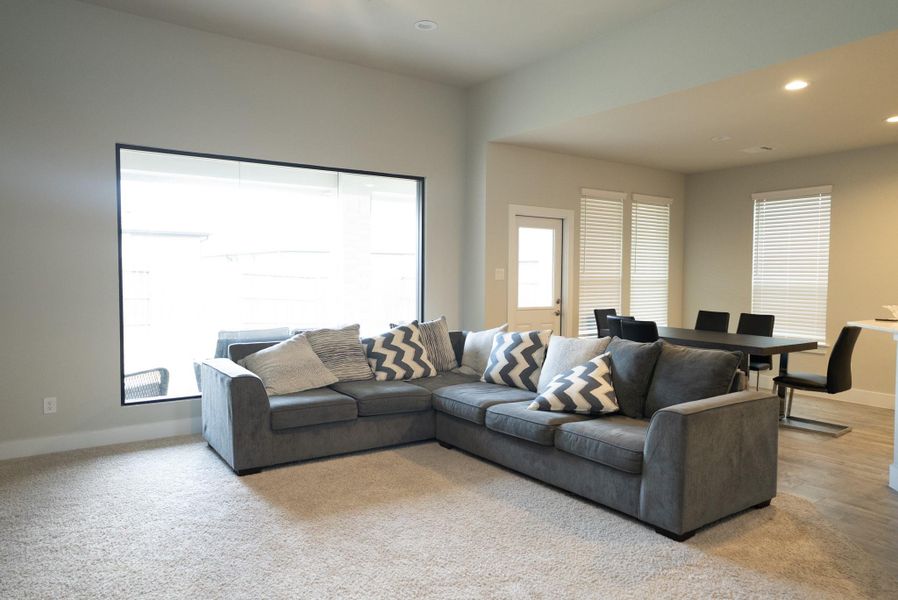 Furnished interior view inside a new home in Sunterra, Katy (Image 19).