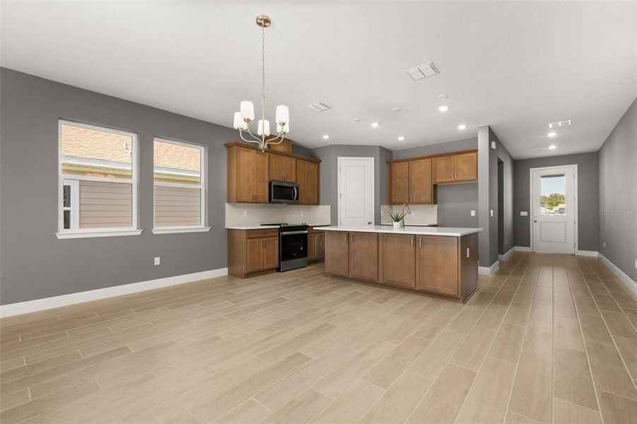 Furnished interior view inside a new home in Green Key Village, Lady Lake (Image 5).