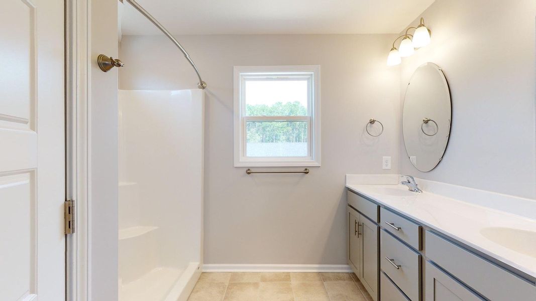 Representative furnished interior of a home built from the Tyler A by JC Jackson Homes,LLC in Heritage Pointe, Newport (Image 13).
