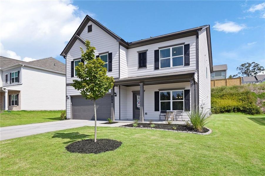 Front exterior of a new home in , Dallas, GA, highlighting curb appeal (Image 24).