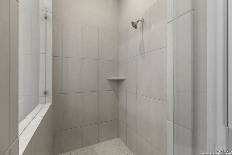 Furnished interior view inside a new home in The Village of Mill Creek 50', Seguin (Image 6).