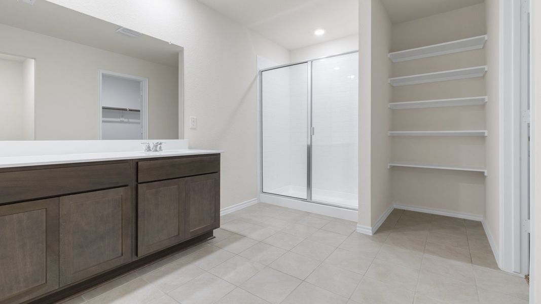 Representative furnished interior of a home built from the X40L Lakeway by D.R. Horton in Valor Farms, Royse City (Image 6).