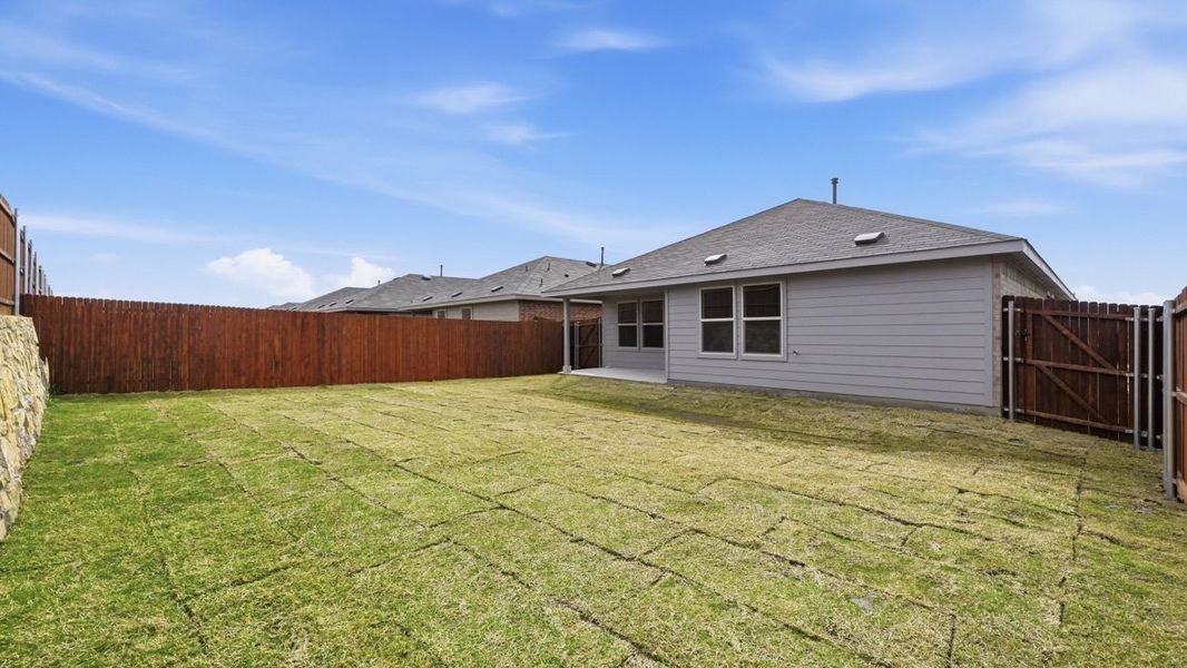 Exterior details and patio area of a home in Hickory Grove, Krum (Image 3).
