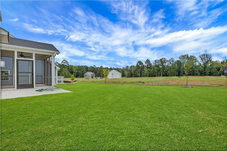 Exterior details and patio area of a home in , Loganville (Image 27).