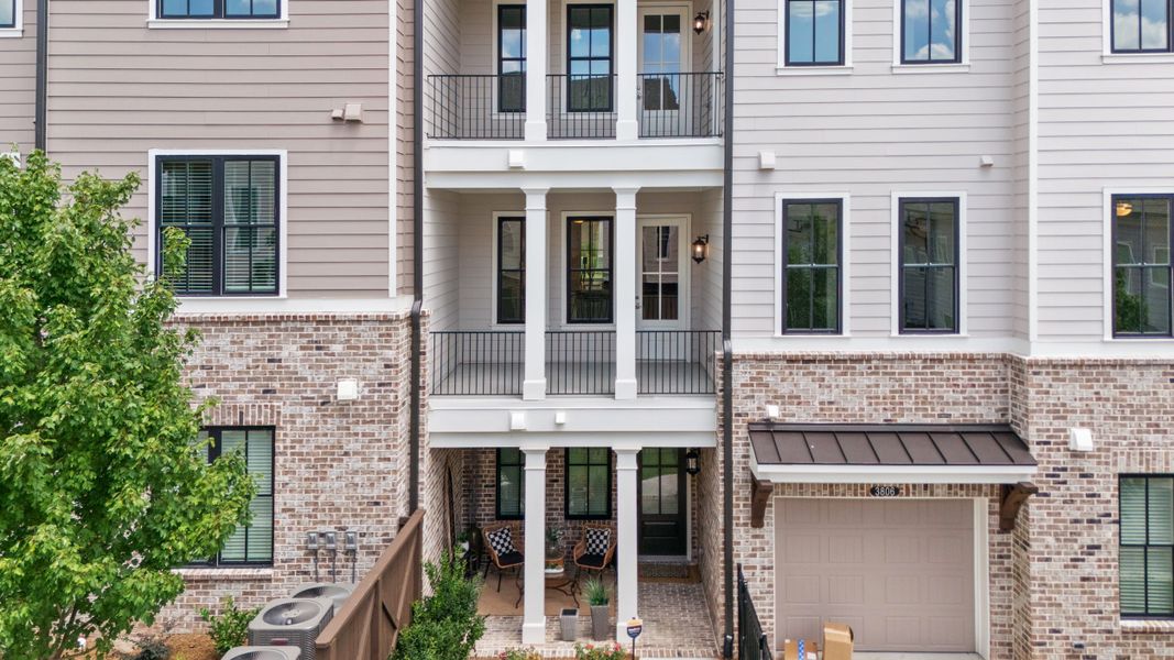 Representative exterior photo of a completed home built from the The Cascade II by The Providence Group in Waterside Condos, Peachtree Corners, GA (Image 2).