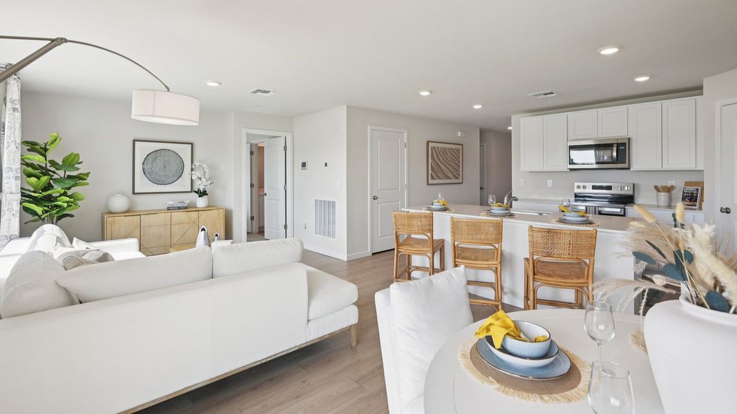 Furnished interior view inside a new home in Cove at West Port - Express, Port Charlotte (Image 8).