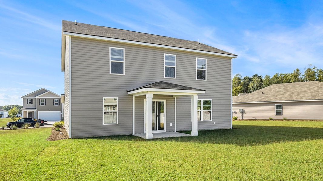 Exterior details and patio area of a home in The Bluffs at Mill Creek, Florence (Image 4). Exterior details and patio area of a home in The Bluffs at Mill Creek, Florence (Image 4).