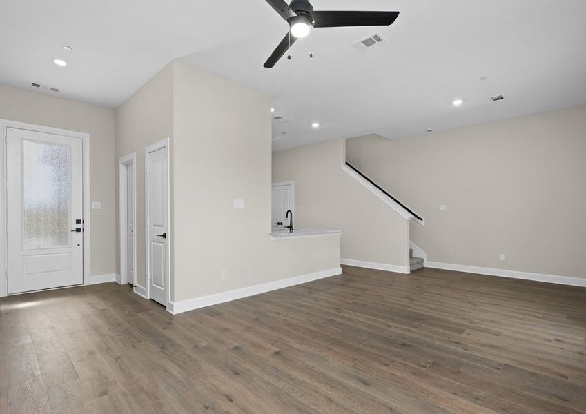 The living room has plenty of space for large furniture.