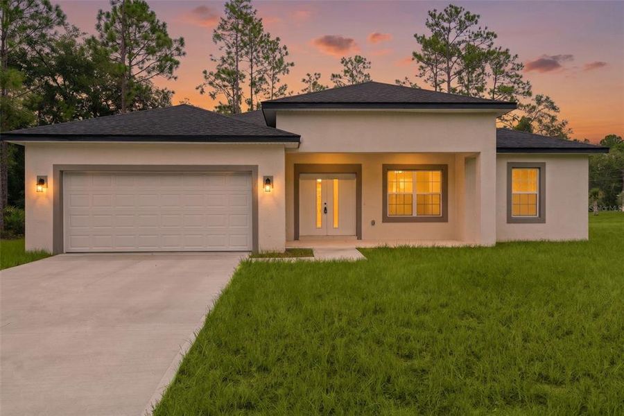 Front exterior of a new home in , Citrus Springs, FL, highlighting curb appeal (Image 22).