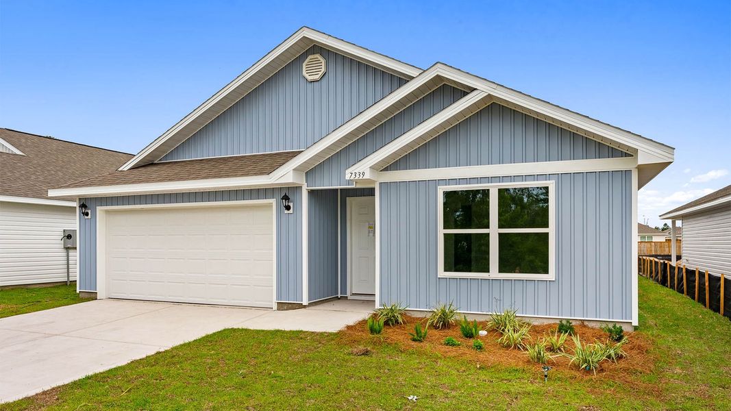 Front exterior of a new home in Morningside, Panama City, FL, highlighting curb appeal (Image 2). Front exterior of a new home in Morningside, Panama City, FL, highlighting curb appeal (Image 2).