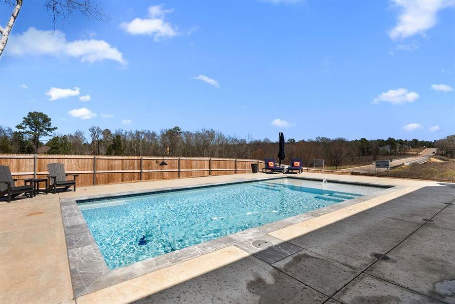 View of pool with a fenced backyard, a patio area, and a fenced in pool View of pool with a fenced backyard, a patio area, and a fenced in pool