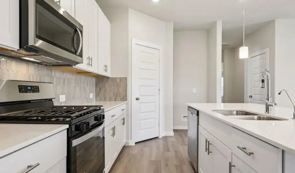 Photo is not of the actual home, but is an inspirational photo of builder’s model home and may depict options, furnishings, and/or decorator features that are not included Photo is not of the actual home, but is an inspirational photo of builder’s model home and may depict options, furnishings, and/or decorator features that are not included