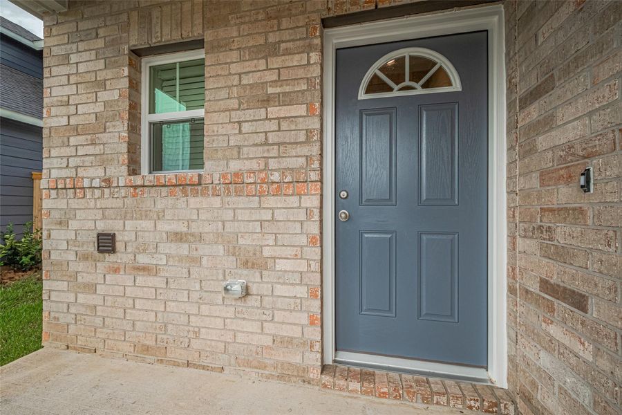 Exterior details and patio area of a home in , Brookshire (Image 4).