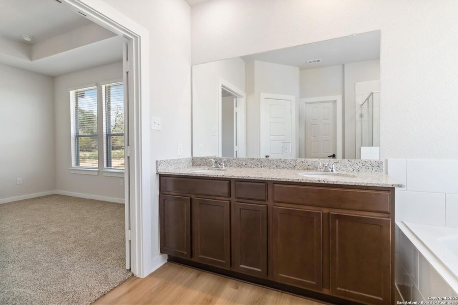 Furnished interior view inside a new home in Jordan's Ranch, San Antonio (Image 6).