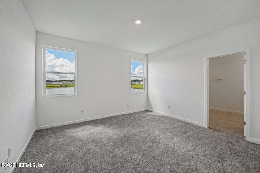 Spacious, unfurnished interior of a new home in Lakes at Bella Lago - Signature Series, Green Cove Springs (Image 29).