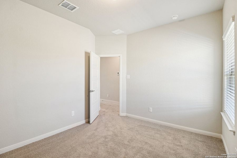 Spacious, unfurnished interior of a new home in Magnolia Village North, San Antonio (Image 23).