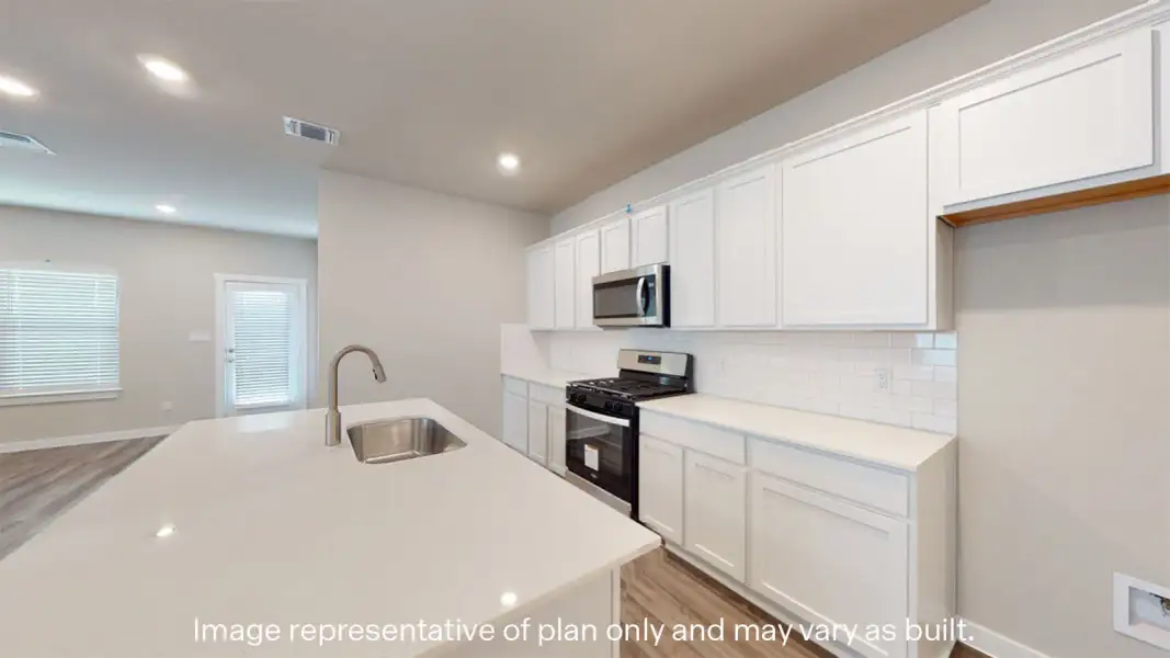 Furnished interior view inside a new home in Heritage Crossing, Corpus Christi (Image 4).