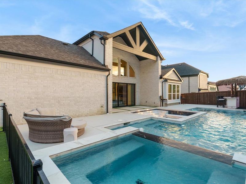 Custom pool featuring multiple levels and an integrated spa Custom pool featuring multiple levels and an integrated spa