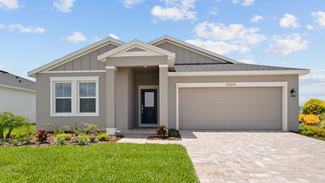 Representative exterior photo of a completed home built from the Castaway by DRB Homes in Willowbrook North, Winter Haven, FL (Image 30). Representative exterior photo of a completed home built from the Castaway by DRB Homes in Willowbrook North, Winter Haven, FL (Image 30).