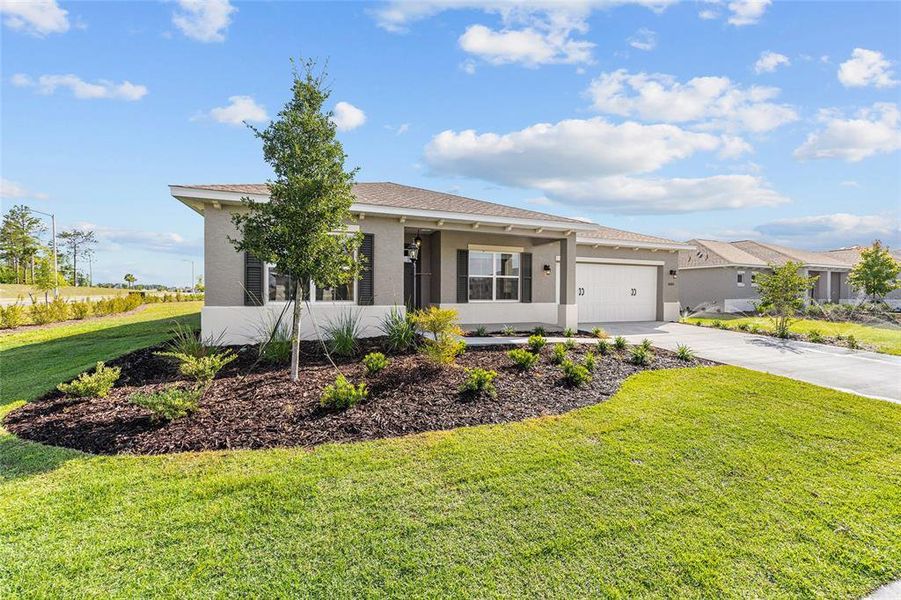 Front exterior of a new home in , Ocala, FL, highlighting curb appeal (Image 17). Front exterior of a new home in , Ocala, FL, highlighting curb appeal (Image 17).