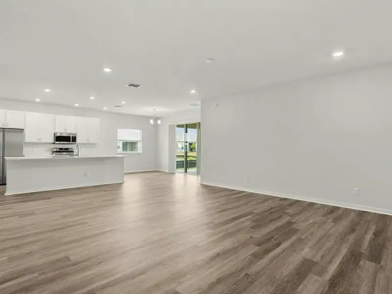 Enjoy a spacious, open-concept living area with LVP flooring, Enjoy a spacious, open-concept living area with LVP flooring,