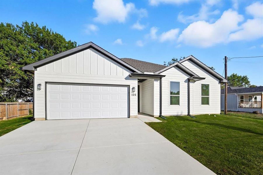 Front exterior of a new home in , Whitesboro, TX, highlighting curb appeal (Image 2). Front exterior of a new home in , Whitesboro, TX, highlighting curb appeal (Image 2).