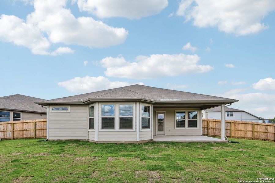 Front exterior of a new home in , Cibolo, TX, highlighting curb appeal (Image 22). Front exterior of a new home in , Cibolo, TX, highlighting curb appeal (Image 22).