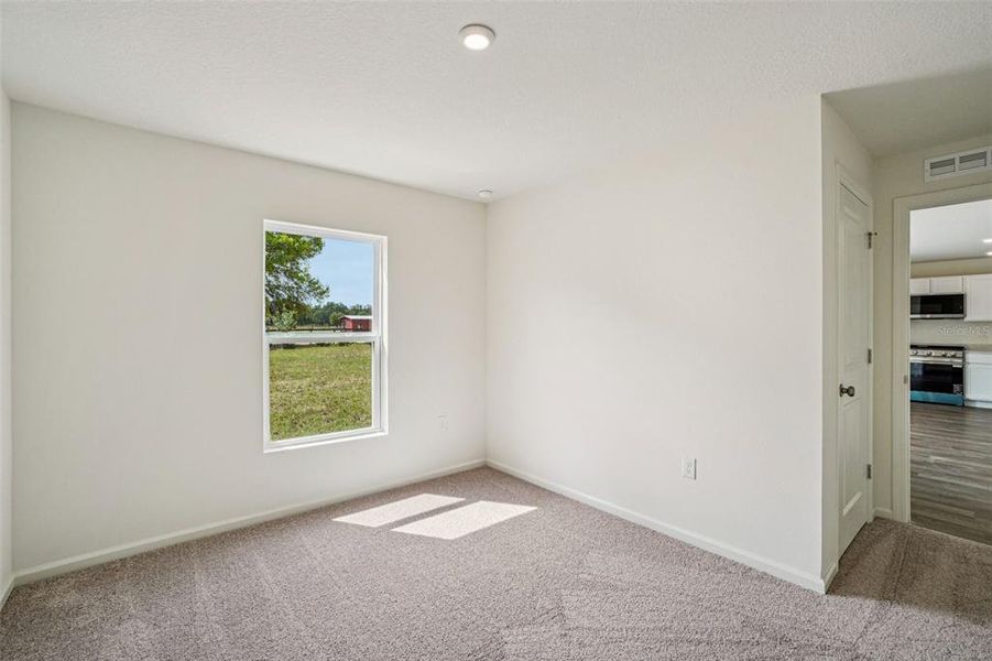 Spacious, unfurnished interior of a new home in Sumter Villas, Sumterville (Image 31).