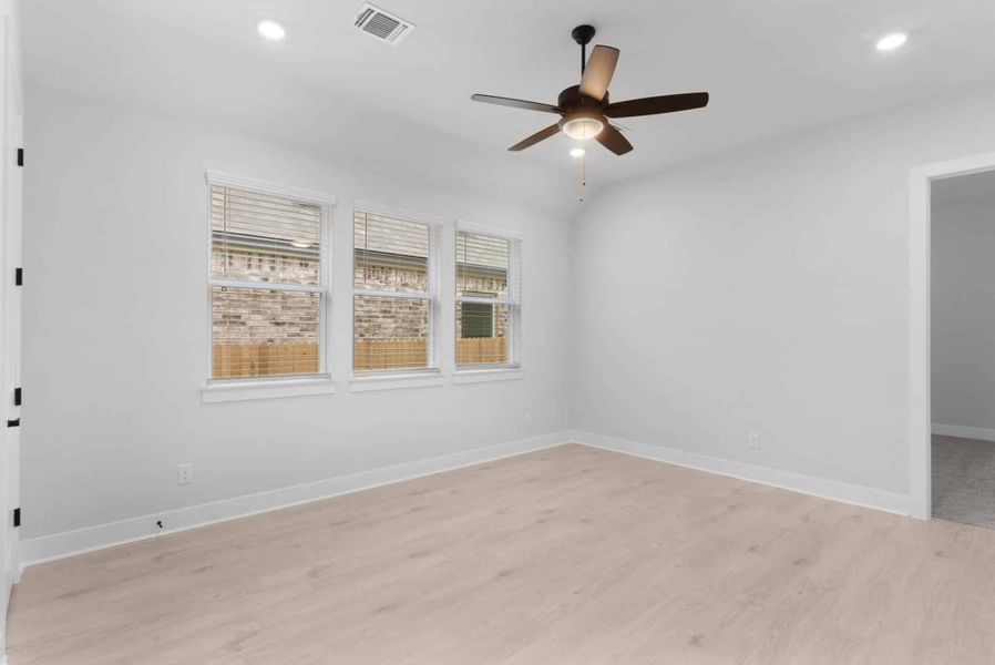 Spacious, unfurnished interior of a new home in The Grove at Blackhawk, Pflugerville (Image 27).
