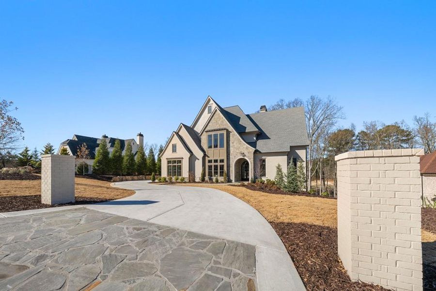 Front exterior of a new home in , Milton, GA, highlighting curb appeal (Image 32).