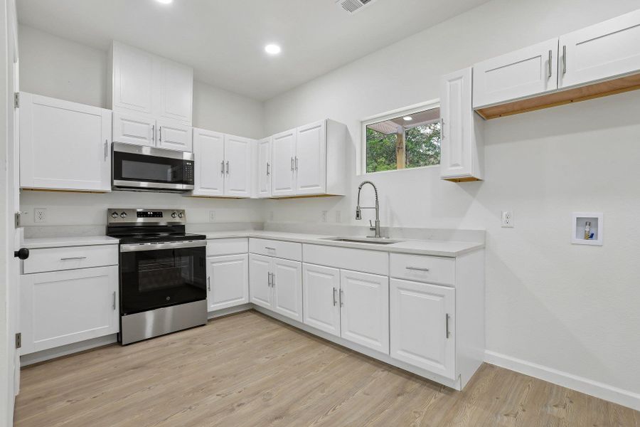 Furnished interior view inside a new home in , Bastrop (Image 8).