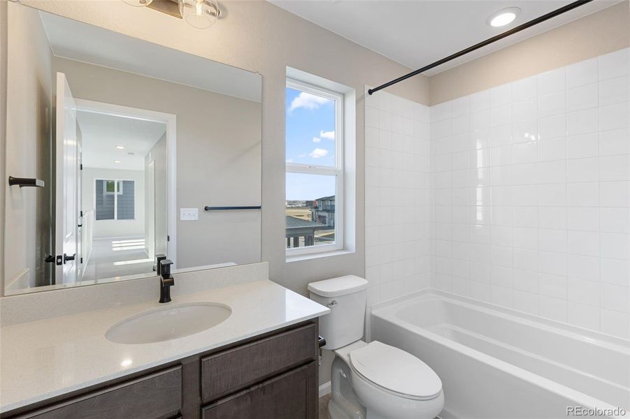 Furnished interior view inside a new home in The Cottages Collection at Ridgeline Vista, Brighton (Image 11).