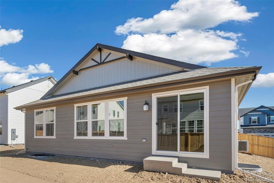 Exterior details and patio area of a home in Windsong, Brighton (Image 22). Exterior details and patio area of a home in Windsong, Brighton (Image 22).