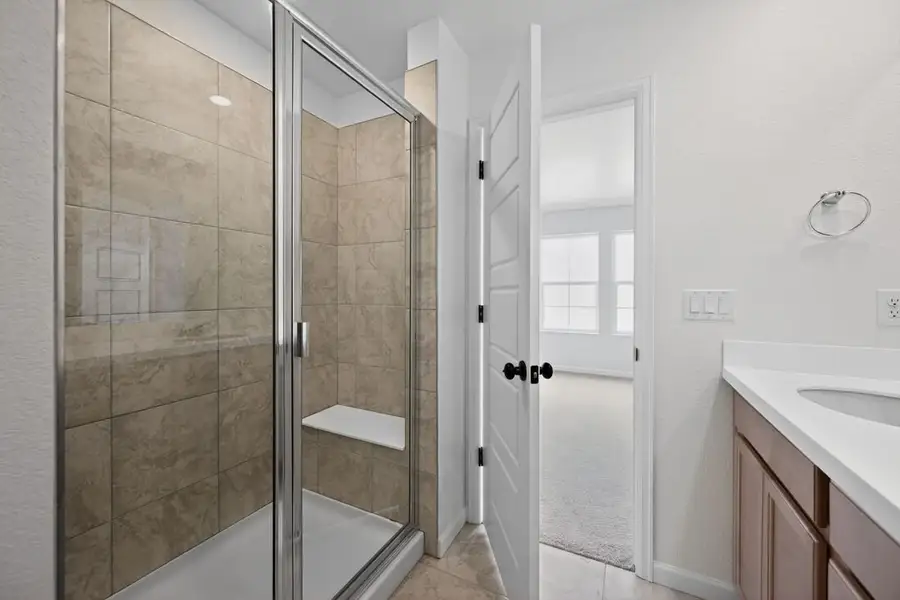 Furnished interior view inside a new home in Trailstone, Arvada (Image 6).