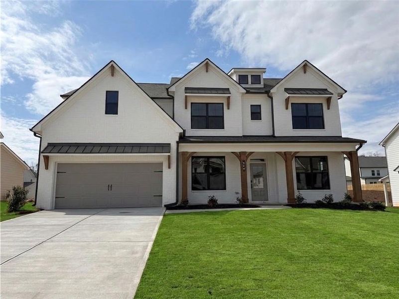 Front exterior of a new home in Rosewood Lake Estates, Hoschton, GA, highlighting curb appeal (Image 25).