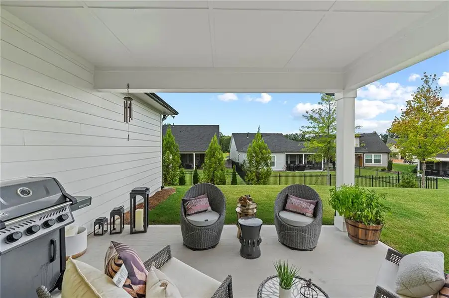 Exterior details and patio area of a home in Crescent Pointe at Great Sky, Canton (Image 3).
