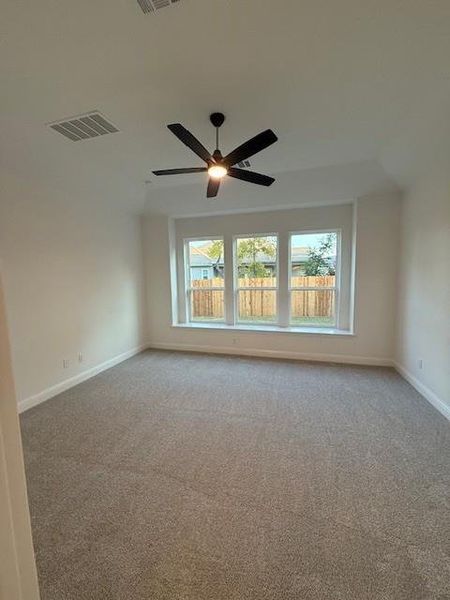 Primary Bedroom with elevated ceiling