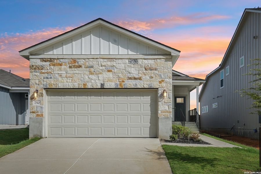 Front exterior of a new home in Highland Ridge, San Antonio, TX, highlighting curb appeal (Image 2). Front exterior of a new home in Highland Ridge, San Antonio, TX, highlighting curb appeal (Image 2).