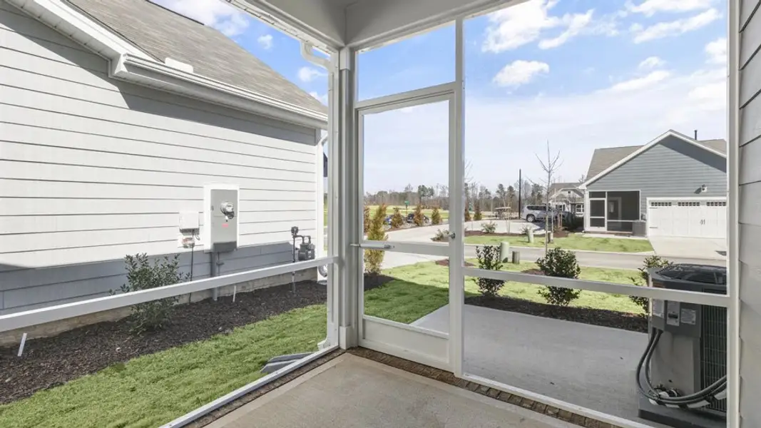 Exterior details and patio area of a home in The Villas at Haywood Glen, Knightdale (Image 4).