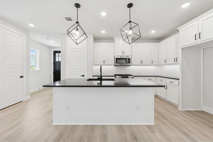 Furnished interior view inside a new home in Painted Tree Woodland West – Cottages, McKinney (Image 7). Furnished interior view inside a new home in Painted Tree Woodland West – Cottages, McKinney (Image 7).