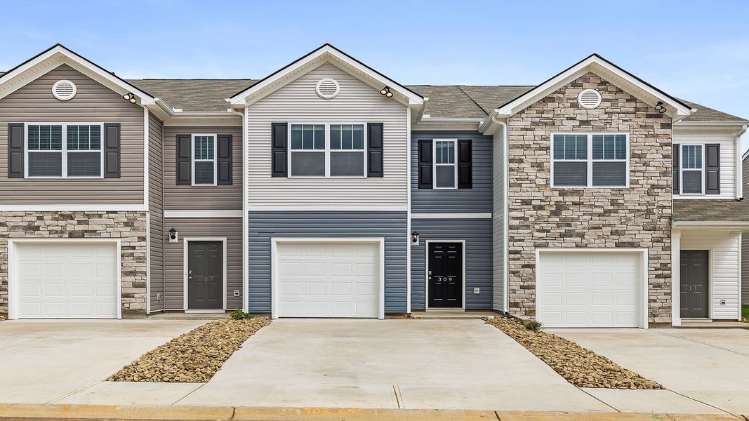 Front exterior of a new home in Brookside Ridge Townhomes, Greer, SC, highlighting curb appeal (Image 1).