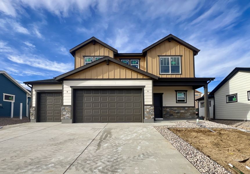 Front exterior of a new home in Union Colony West, Greeley, CO, highlighting curb appeal (Image 17).