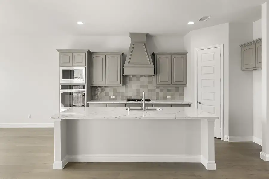 Representative furnished interior of a home built from the Sherman by Windsor Homes in Anna Town Square, Anna (Image 4).