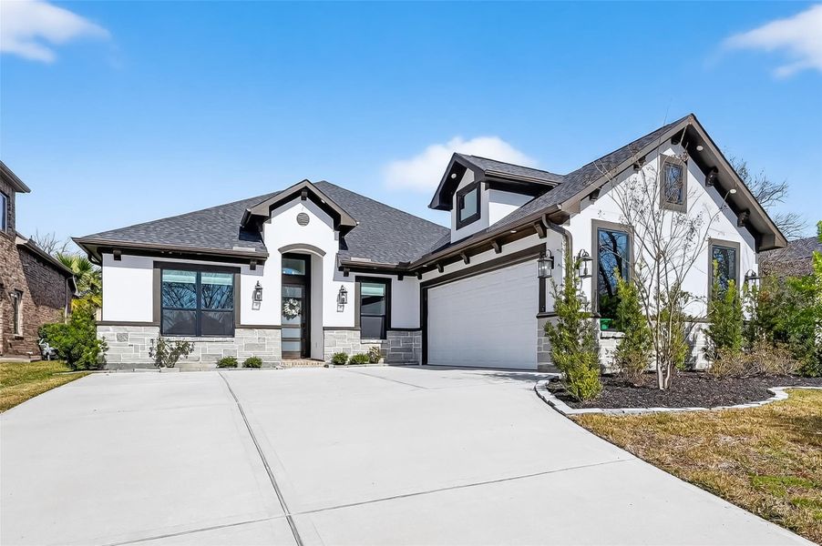 Curb appeal showcasing landscaped frontage and spacious parking. Curb appeal showcasing landscaped frontage and spacious parking.