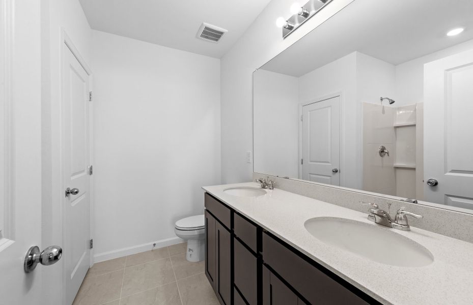 Furnished interior view inside a new home in Caloosa Cove, Labelle (Image 9).