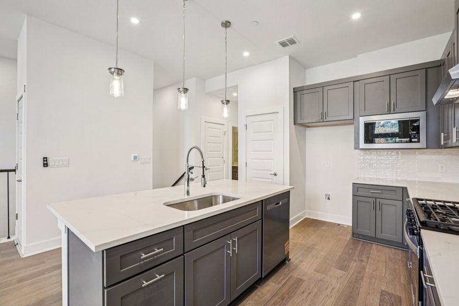 Furnished interior view inside a new home in Koenig Townhomes, Austin (Image 5).